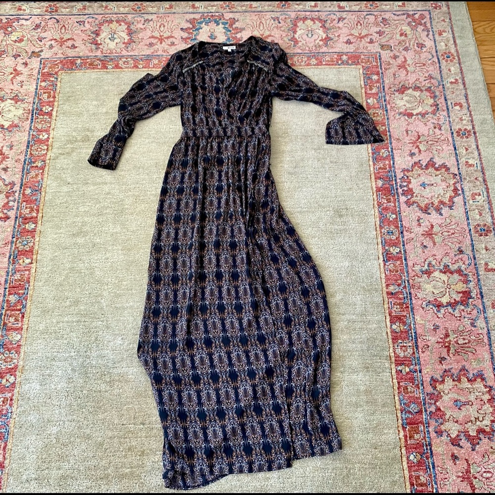 Dress is sheer at the bottom with a slit